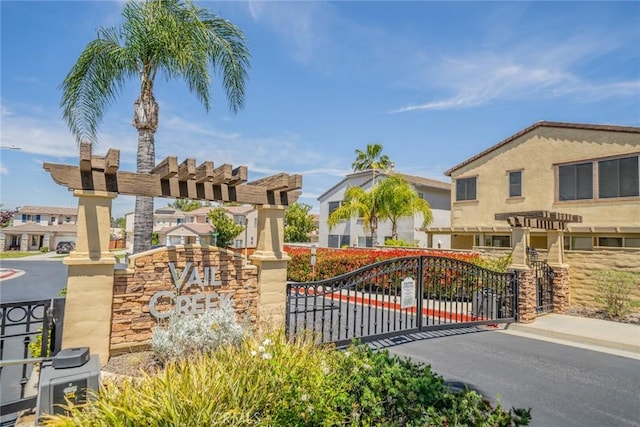 32674 Clearvail Dr, Temecula, CA 92592 - community / neighborhood sign featuring a gate and a residential view