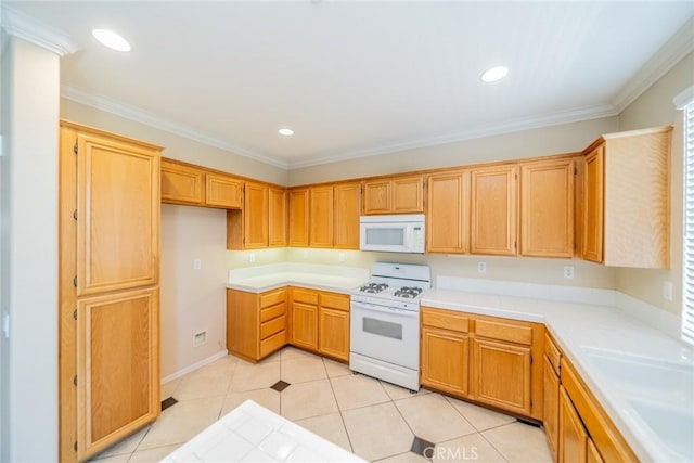 32674 Clearvail Dr, Temecula, CA 92592 - kitchen with white appliances, light countertops, a sink, light tile patterned floors, and recessed lighting