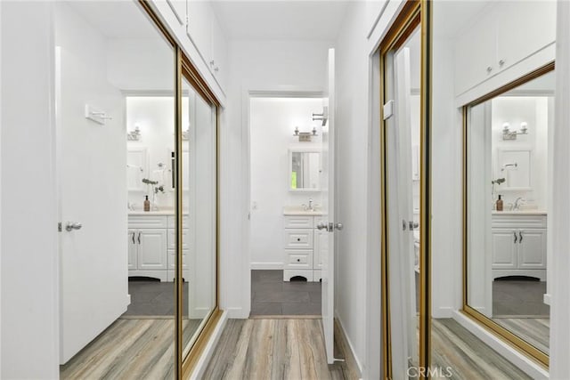 8163 Billowvista Dr, Playa Del Rey, CA 90293 - hallway with a sink and light wood-style flooring