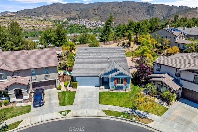 aerial view with a mountain view and a residential view
