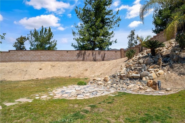 view of yard with fence