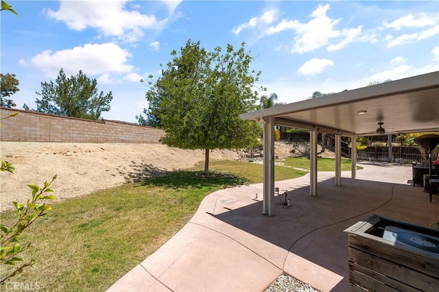 view of patio / terrace with ceiling fan and a fenced backyard