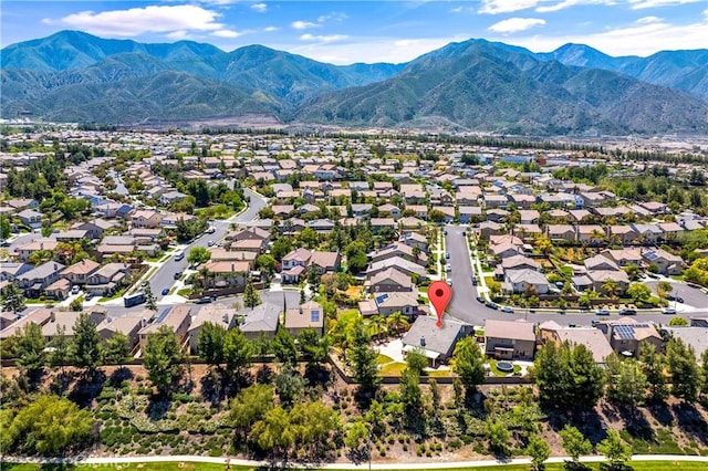 bird's eye view with a residential view and a mountain view