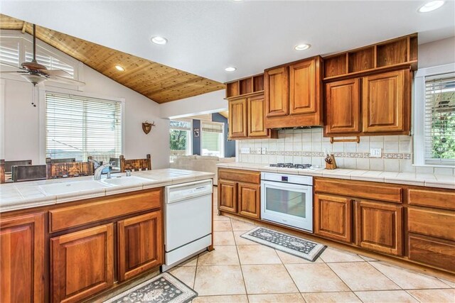 6377 Sugar Pines Cir, Angelus Oaks, CA 92305 - kitchen featuring white appliances, tile countertops, a sink, plenty of natural light, and recessed lighting