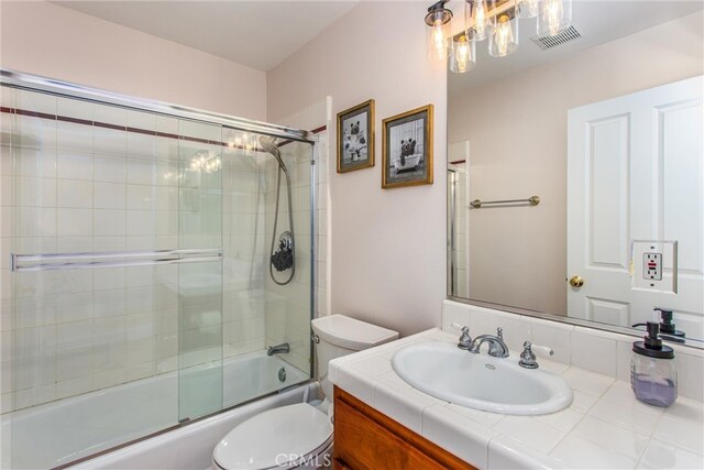 6377 Sugar Pines Cir, Angelus Oaks, CA 92305 - bathroom with toilet, combined bath / shower with glass door, and vanity