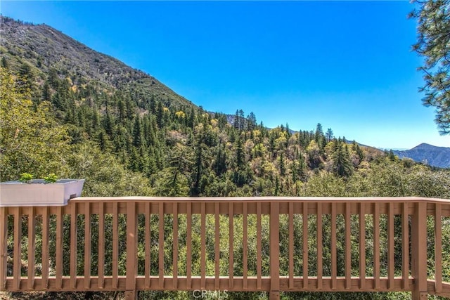 6377 Sugar Pines Cir, Angelus Oaks, CA 92305 - mountain view featuring a heavily wooded area