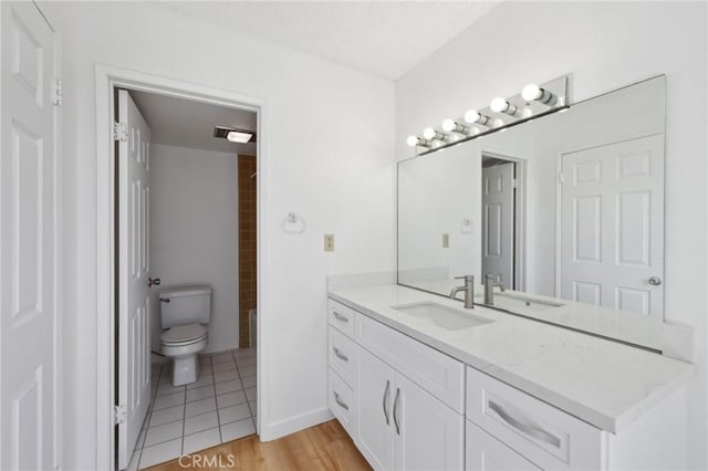 10966 Rochester Ave Unit 5D, Los Angeles, CA 90024 - full bath with toilet, tile patterned floors, and vanity