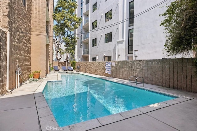 10966 Rochester Ave Unit 5D, Los Angeles, CA 90024 - community pool featuring fence and a patio area