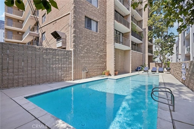 10966 Rochester Ave Unit 5D, Los Angeles, CA 90024 - pool featuring fence