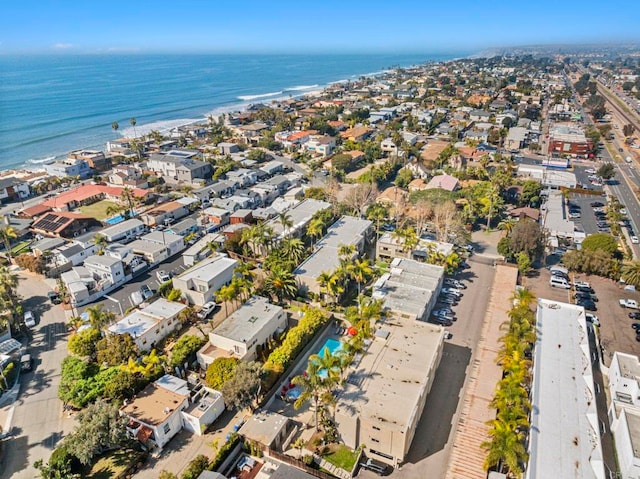 birds eye view of property featuring a water view and a residential view