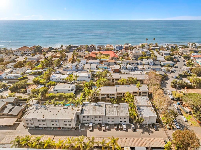bird's eye view with a water view and a residential view