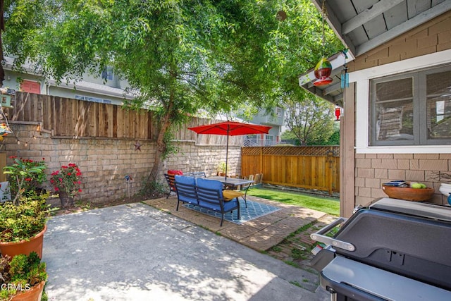 1318 N Marengo Ave, Pasadena, CA 91103 - view of patio with a fenced backyard, area for grilling, and outdoor dining space