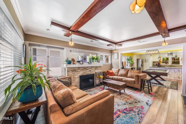 1318 N Marengo Ave, Pasadena, CA 91103 - living area with beam ceiling, wood-type flooring, a fireplace, and ornamental molding