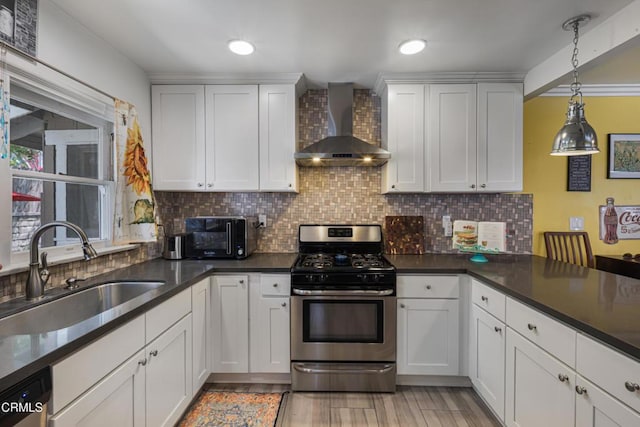 1318 N Marengo Ave, Pasadena, CA 91103 - kitchen with gas range, wall chimney range hood, a sink, decorative backsplash, and light wood-style flooring