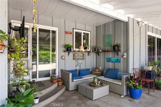 sunroom / solarium with an outdoor hangout area