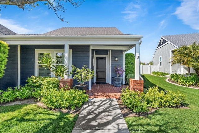 3 Treethorne Cir, Laguna Niguel, CA 92677 - view of front of house with fence, a shingled roof, a porch, and a front yard