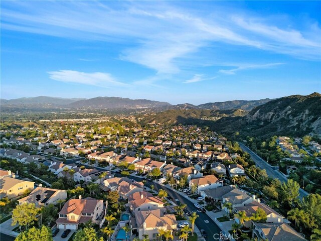 26238 Beecher Ln, Stevenson Ranch, CA 91381 - aerial view of property and surrounding area featuring mountains and nearby suburban area