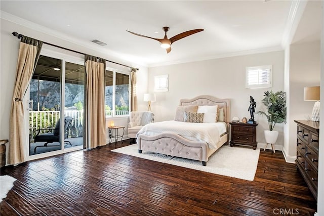 bedroom with wood-type flooring, crown molding, visible vents, and access to exterior