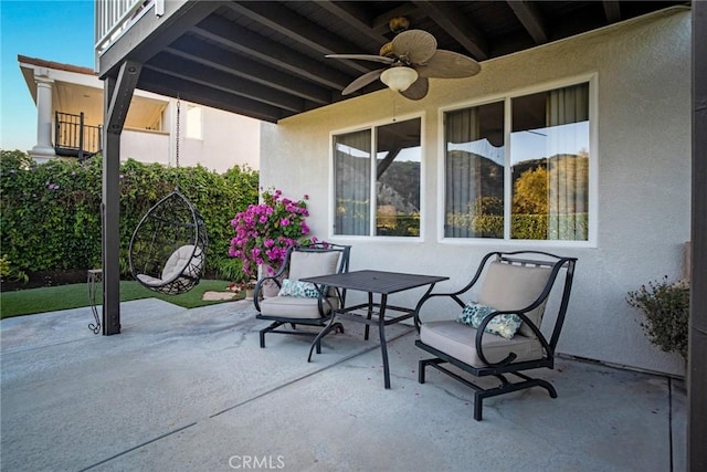 view of patio with a ceiling fan