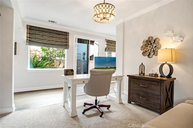 home office with visible vents, ornamental molding, carpet floors, an inviting chandelier, and baseboards