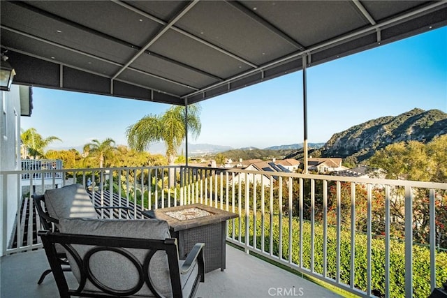 balcony featuring a mountain view