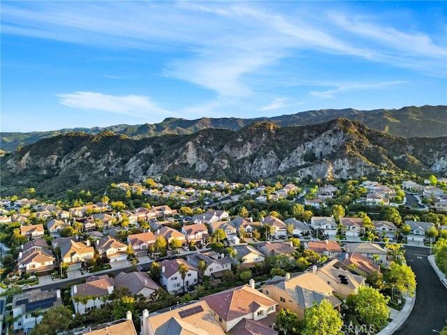bird's eye view featuring a residential view and a mountain view