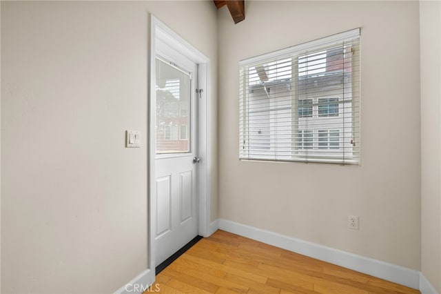 1210 Southwood Dr, San Luis Obispo, CA 93401 - doorway with baseboards and light wood finished floors