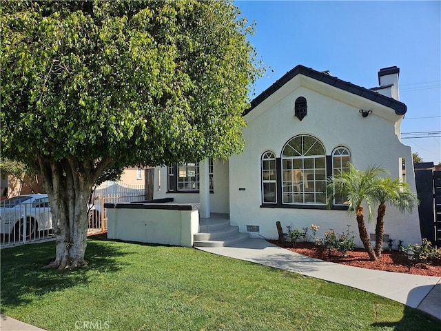 3612 Liberty Blvd, South Gate, CA 90280 - view of front of house with a chimney and stucco siding
