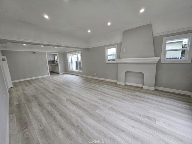 3612 Liberty Blvd, South Gate, CA 90280 - unfurnished living room with recessed lighting, baseboards, and light wood-type flooring