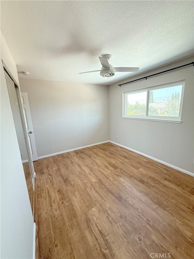 1613 Kane Ave, Simi Valley, CA 93065 - empty room featuring light wood-type flooring, a ceiling fan, and a textured ceiling