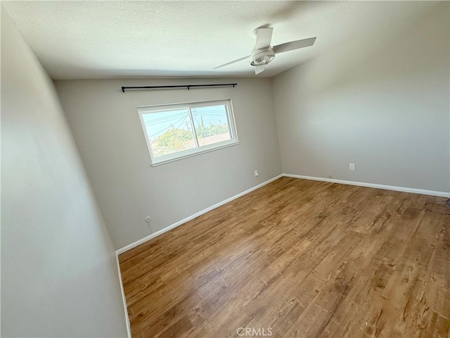 1613 Kane Ave, Simi Valley, CA 93065 - empty room featuring wood finished floors, a ceiling fan, and a textured ceiling