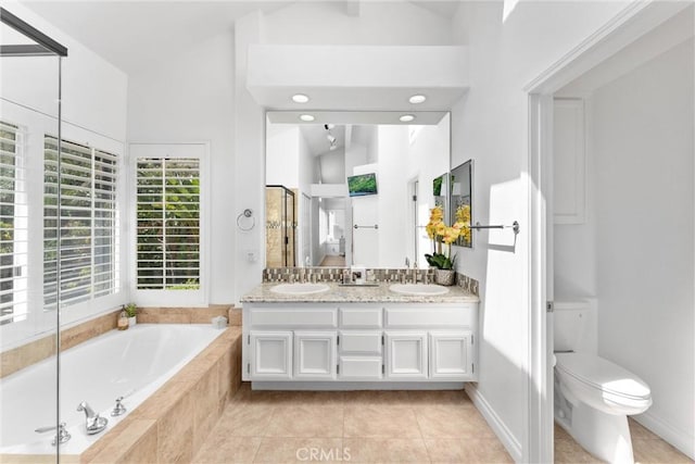 1720 San Alvarado Cir, Corona, CA 92882 - full bathroom with a bath, toilet, double vanity, lofted ceiling, and tile patterned floors