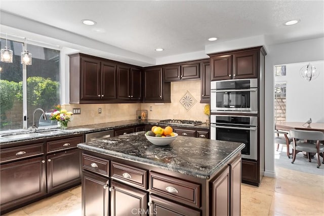 1720 San Alvarado Cir, Corona, CA 92882 - kitchen featuring a sink, stainless steel appliances, recessed lighting, and dark brown cabinetry