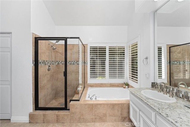 1720 San Alvarado Cir, Corona, CA 92882 - bathroom featuring a stall shower, a bath, and vanity