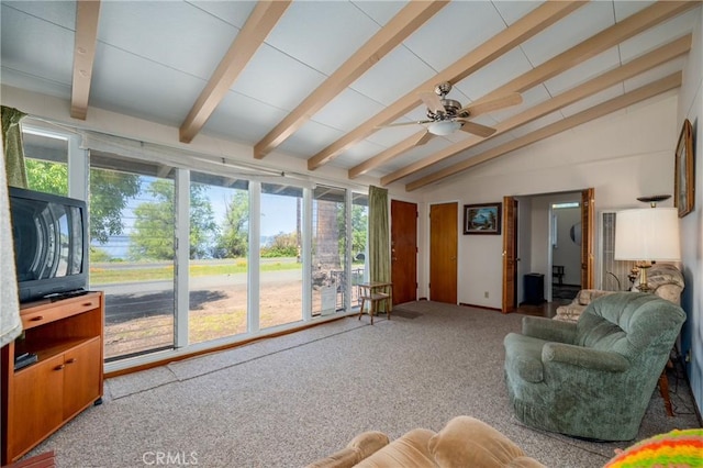 6828 Frontage Rd, Lucerne, CA 95458 - living area featuring vaulted ceiling with beams, carpet flooring, a ceiling fan, and a wealth of natural light