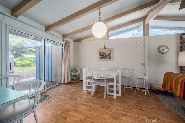6828 Frontage Rd, Lucerne, CA 95458 - dining area featuring lofted ceiling with beams and light wood-style flooring