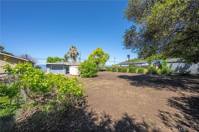 6828 Frontage Rd, Lucerne, CA 95458 - view of yard featuring fence