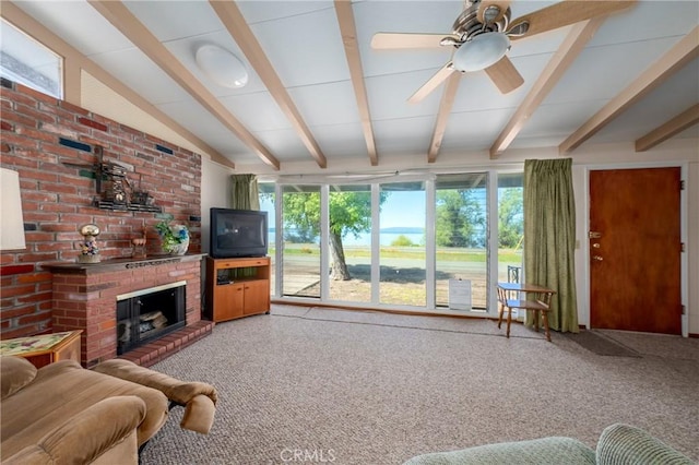 6828 Frontage Rd, Lucerne, CA 95458 - living room with vaulted ceiling with beams, ceiling fan, a wealth of natural light, and light carpet