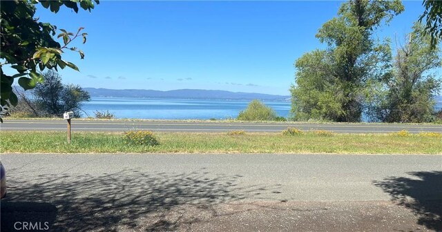 6828 Frontage Rd, Lucerne, CA 95458 - view of water feature with a mountain view