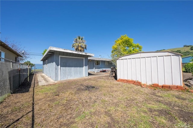 6828 Frontage Rd, Lucerne, CA 95458 - view of shed featuring fence