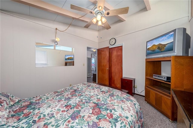 6828 Frontage Rd, Lucerne, CA 95458 - bedroom with beamed ceiling, carpet, and a ceiling fan