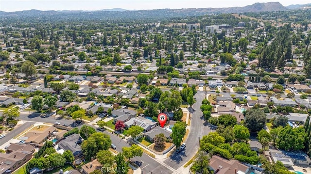bird's eye view featuring a residential view and a mountain view