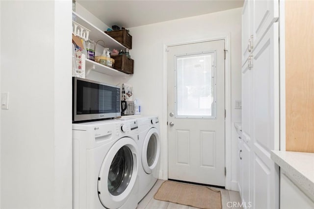 laundry area featuring laundry area and independent washer and dryer