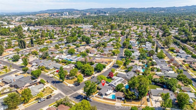 birds eye view of property featuring a residential view and a mountain view