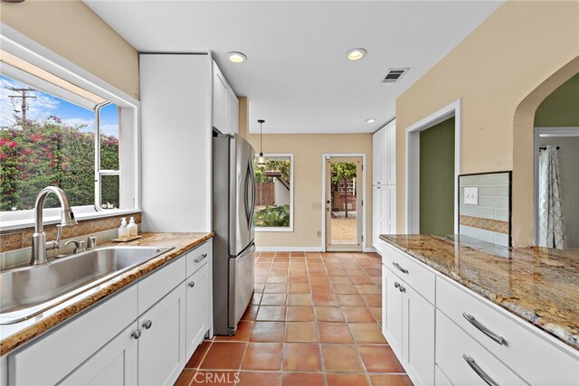 336 Marwood Ave, Fullerton, CA 92832 - kitchen featuring freestanding refrigerator, a sink, plenty of natural light, white cabinetry, and recessed lighting