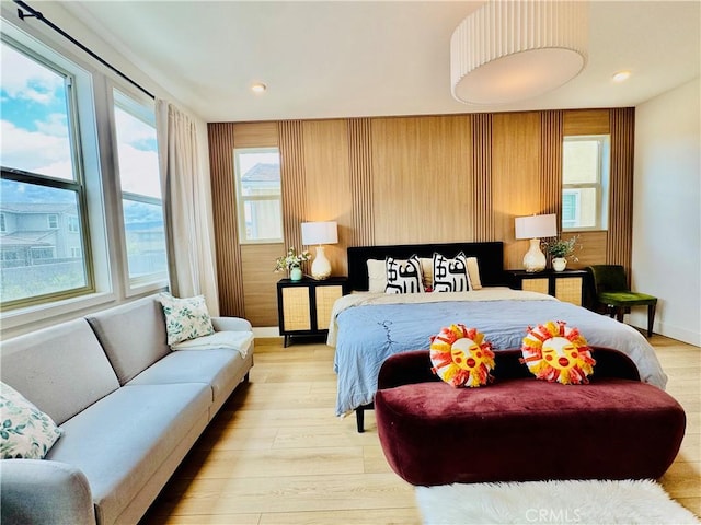 bedroom featuring light wood-style floors and recessed lighting