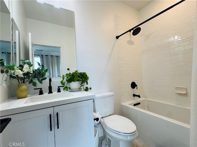 bathroom featuring toilet, shower / bath combination, and vanity