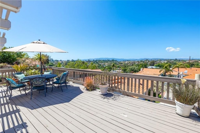 deck featuring outdoor dining space