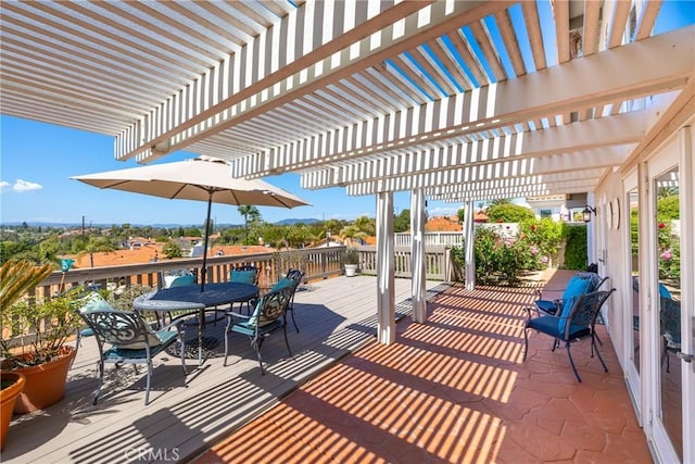 view of patio / terrace featuring outdoor dining space, a pergola, and a deck