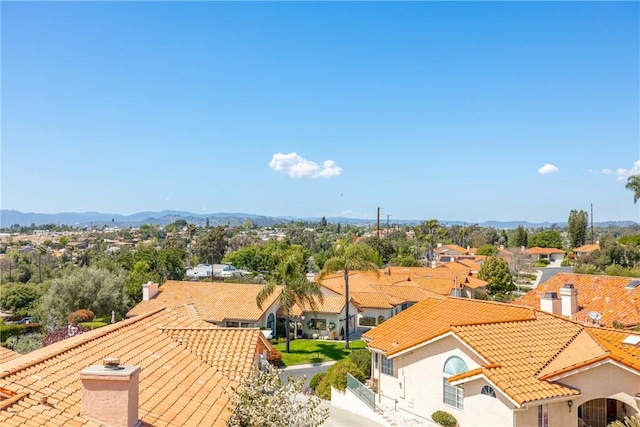 drone / aerial view with a mountain view and a residential view